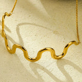 elegance with our 18K gold-plated wave necklace.