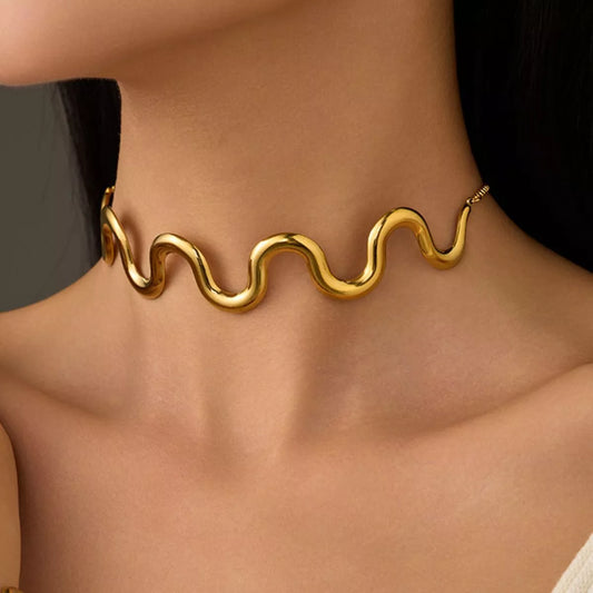  elegance with our 18K gold-plated wave necklace.